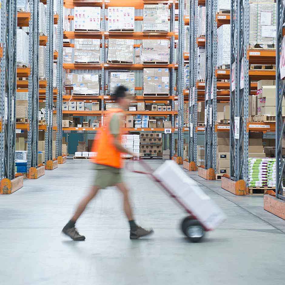 Warehouse employee quickly executing fulfillment requests thanks to DocuSign Agreement Cloud for Procurement.